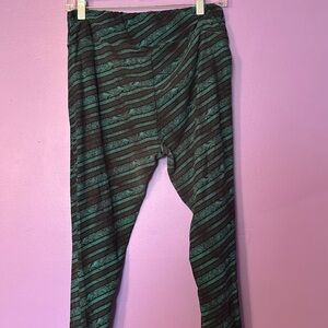 Green and black striped leggings